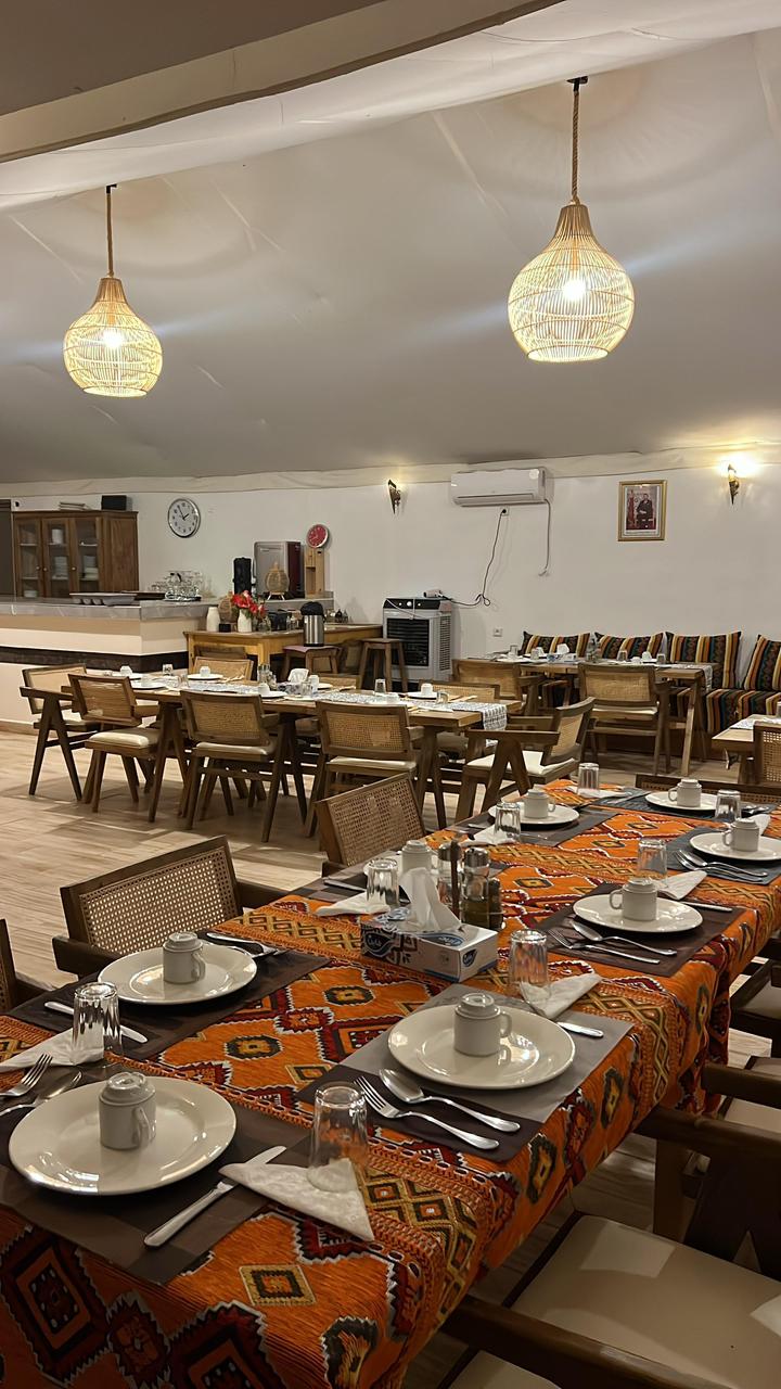 Moroccan restaurant interior at Sahara Royal Resort luxury desert camp Merzouga